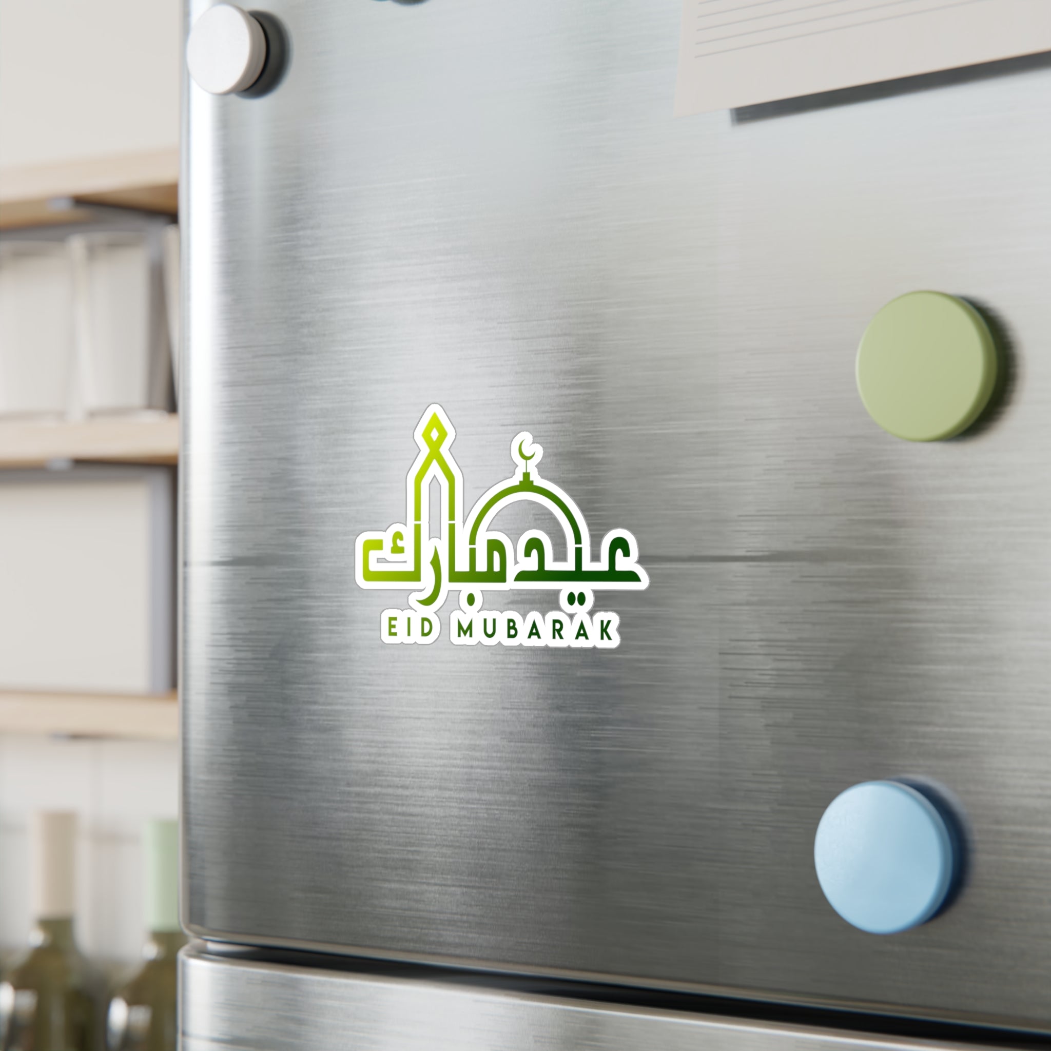 Medina Roots Eid Mubarak transparent outdoor sticker on a stainless steel fridge door with notes and a colorful magnet.