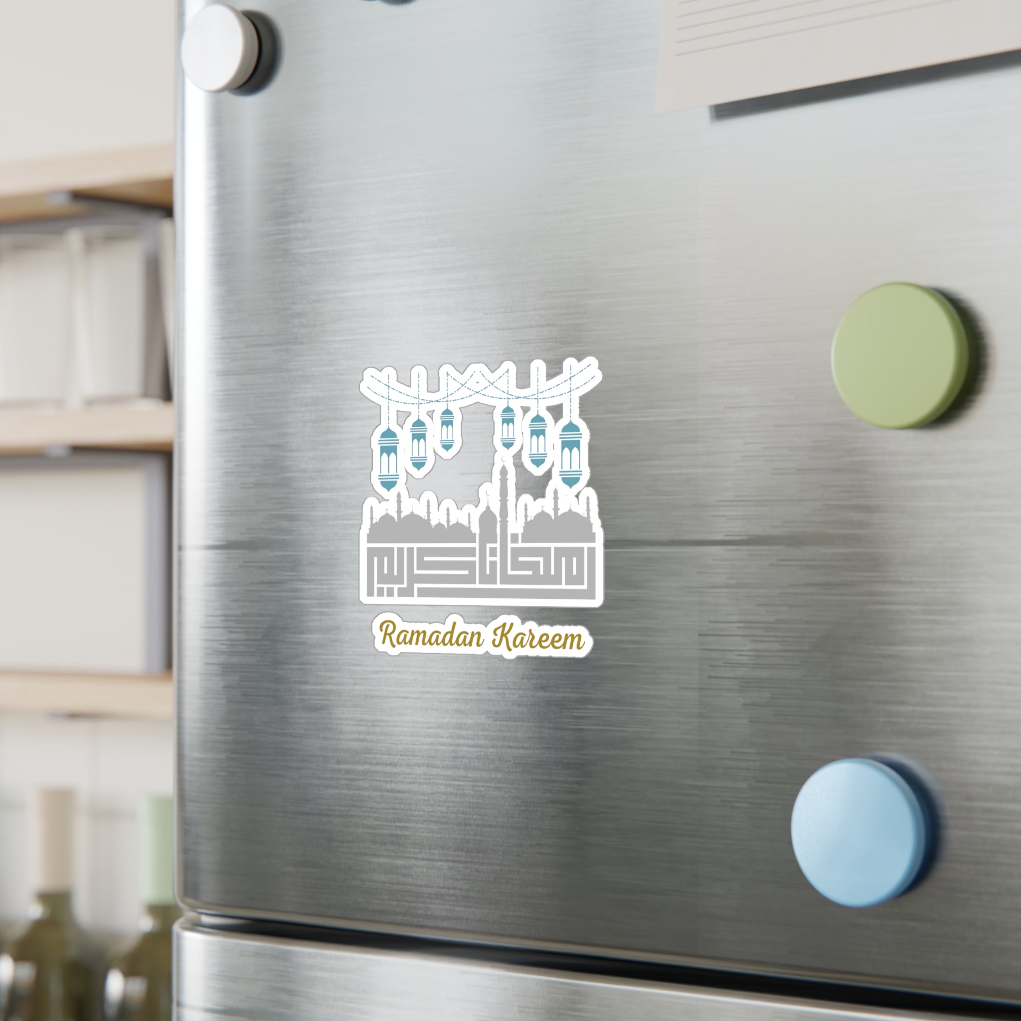 Ramadan-themed magnets on a refrigerator door, adding a spiritual ambiance with the "Ramadan Kareem Kiss-Cut Vinyl Decal" by Medina Roots.