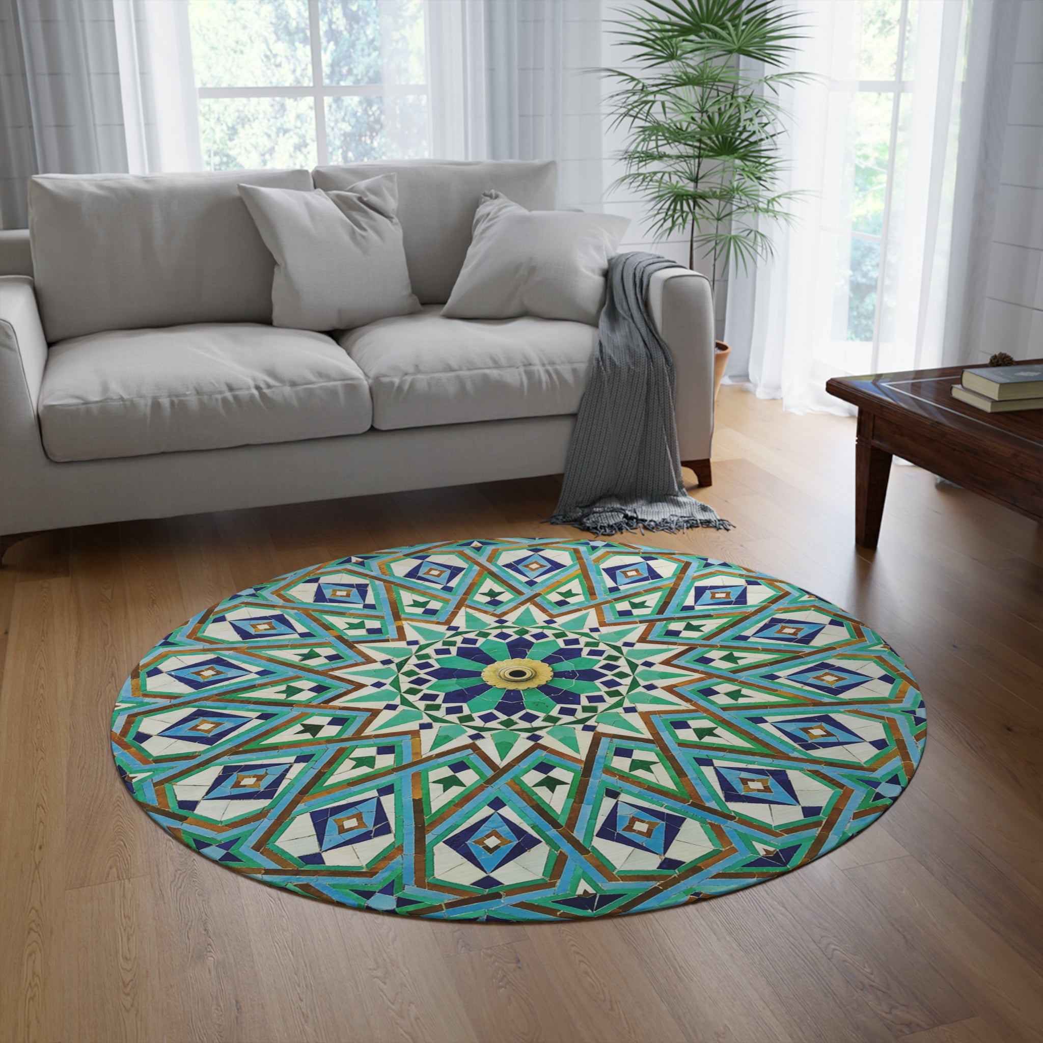 A Vibrant Zellige Geometric Patterned Rug from Medina Roots in Stunning Blue Hues in a living room with a beige sofa and wooden coffee table.