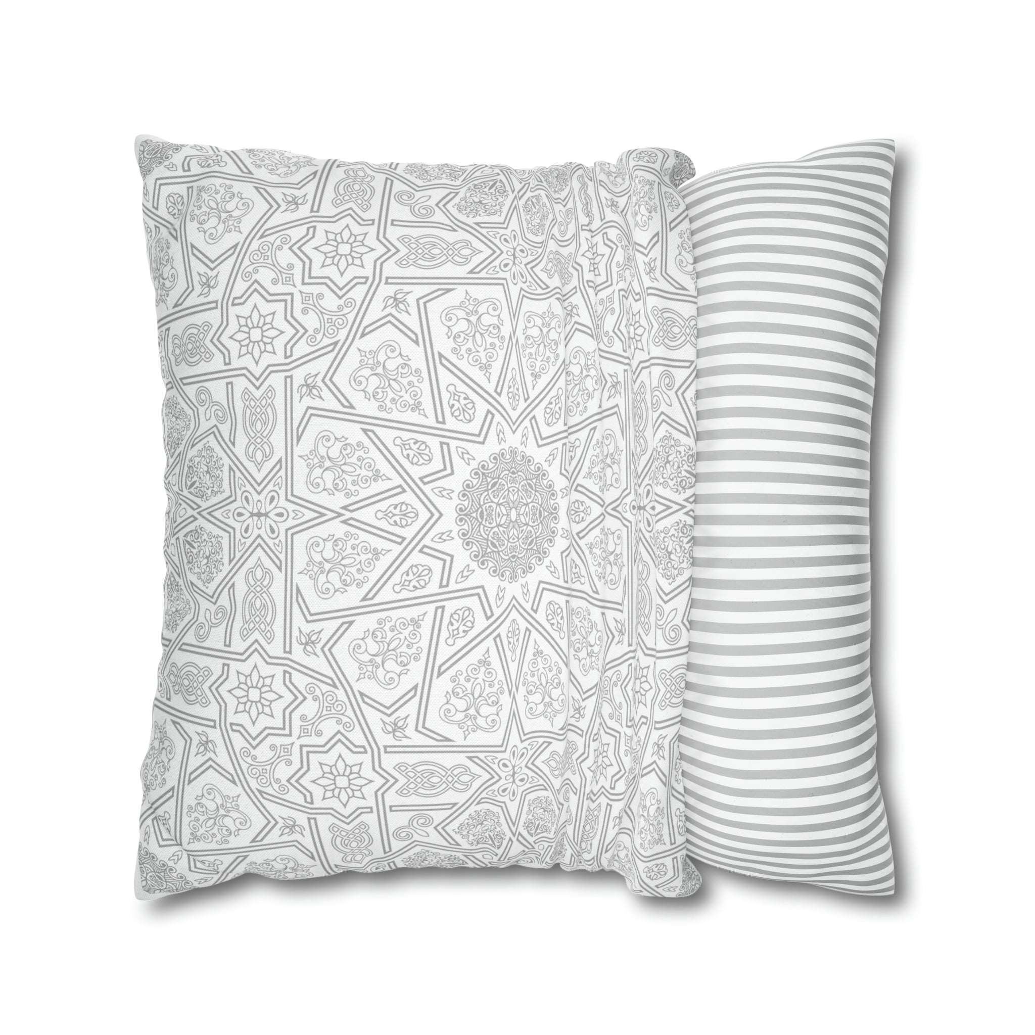 Two Medina Roots decorative throw pillow covers with contrasting patterns for home decor, one featuring intricate geometric patterns and the other with horizontal stripes.