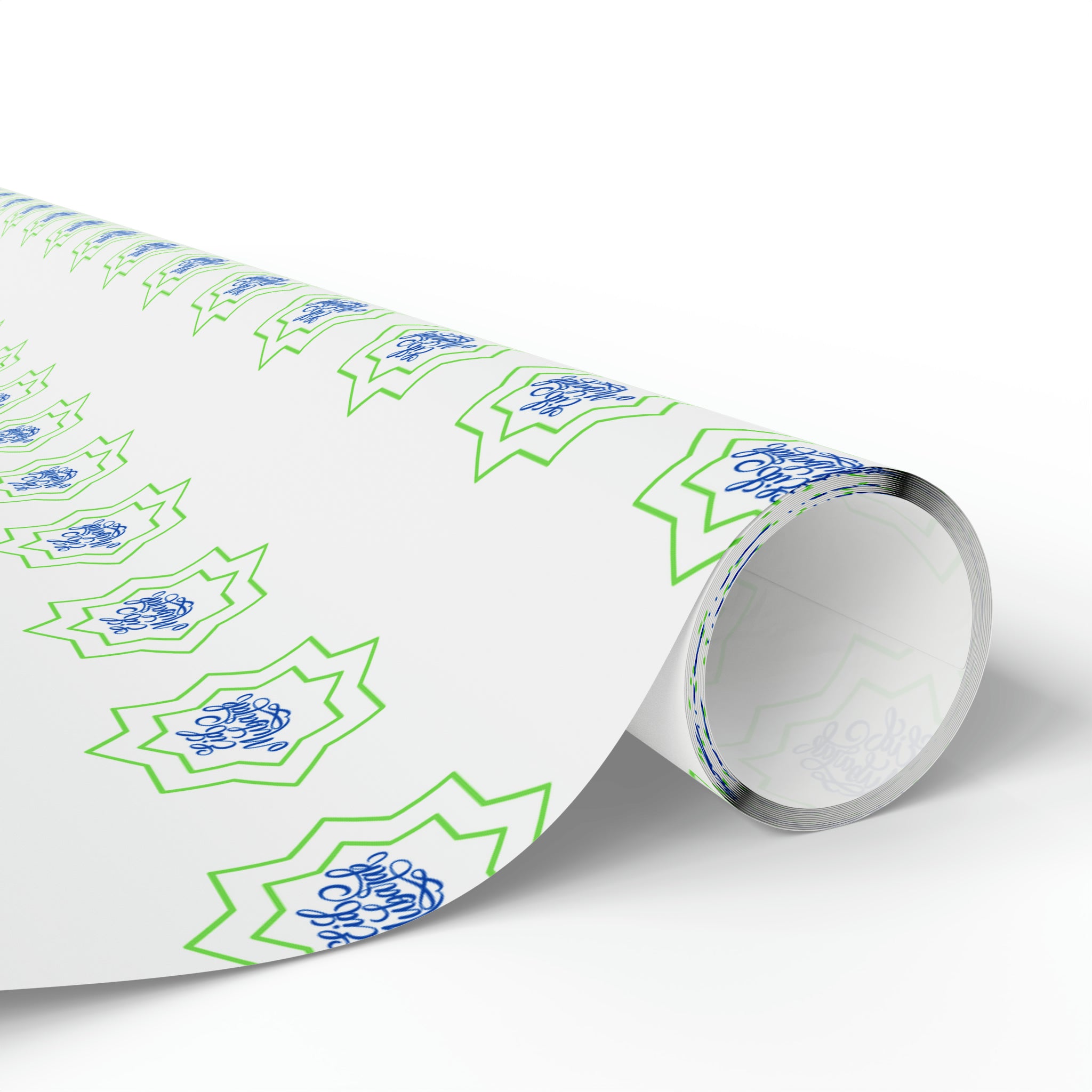 Roll of Eid Celebration Wrapping Paper with blue and green geometric patterns on a plain background, perfect for Ramadan by Medina Roots.