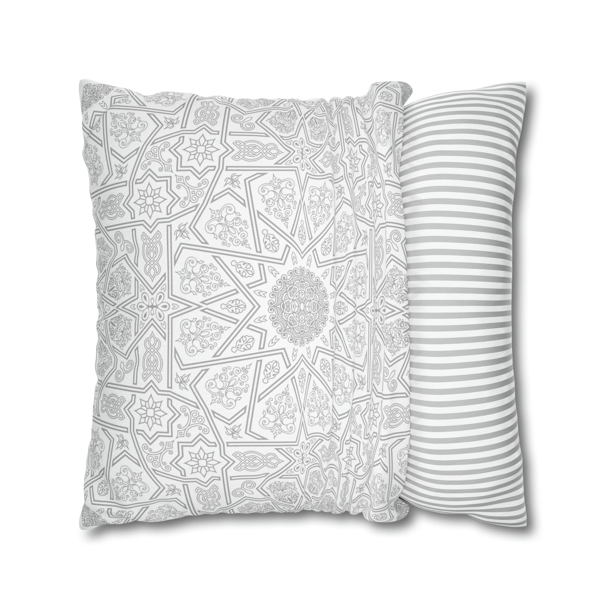 Two Geometric Patterned Throw Pillow Covers from Medina Roots with intricate geometric patterns on a white background.